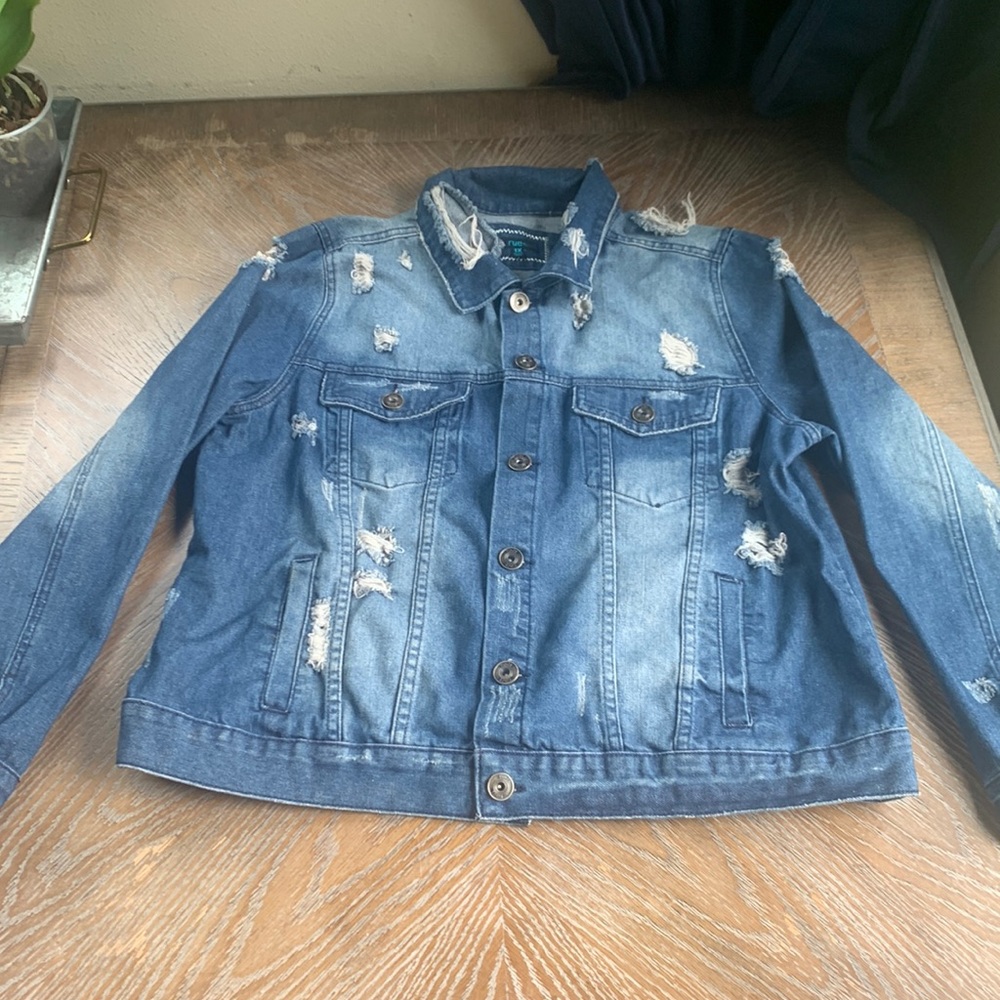 Distressed denim jacket